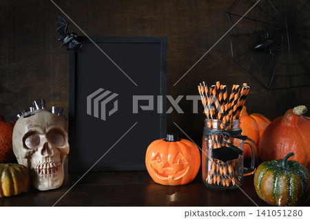 Halloween pumpkin head jack-o-lantern on wooden background Halloween pumpkin head jack-o-lantern on wooden background 141051280