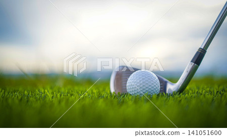 Golf clubs and balls on a green lawn in a beautiful golf course with morning sunshine. 141051600