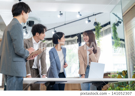 Engineers having a meeting in the office Engineers having a meeting in the office 141052307