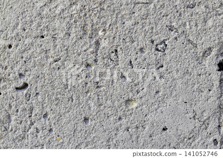 Textured pattern of a concrete wall. 141052746