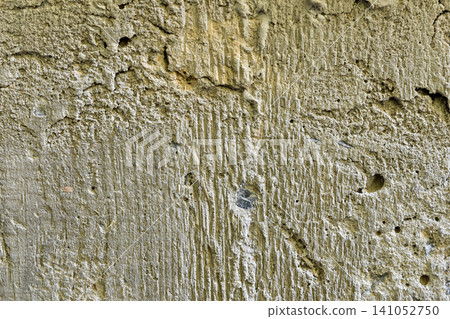 Textured pattern of a concrete wall. Textured pattern of a concrete wall. 141052750