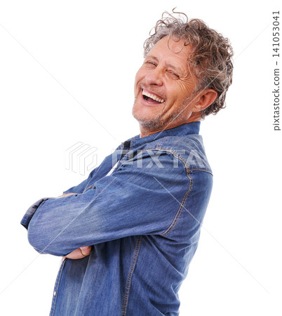 Portrait, confidence and happy mature man laughing in studio isolated on a white background. Arms crossed, funny and face of person in casual clothes or denim jacket for fashion on backdrop in Canada Portrait, confidence and happy mature man laughing in studio isolated on a white background. Arms crossed, funny and face of person in casual clothes or denim jacket for fashion on backdrop in Canada 141053041