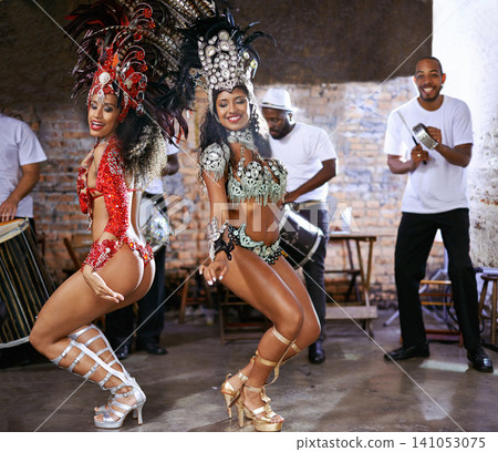 Women, samba and stage for performance at carnival, band or dancer with smile, culture or creative in nightclub. Girl, people and dancing to music, show and fashion for celebration in Rio de Janeiro Women, samba and stage for performance at carnival, band or dancer with smile, culture or creative in nightclub. Girl, people and dancing to music, show and fashion for celebration in Rio de Janeiro 141053075