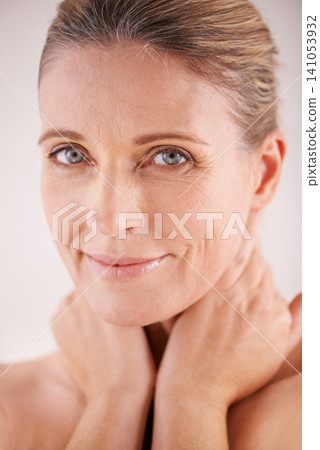 Glow, portrait or mature woman with beauty, confidence or facial treatment in studio on white background. Face, skincare benefits or model with natural shine, smile or anti aging cosmetics results Glow, portrait or mature woman with beauty, confidence or facial treatment in studio on white background. Face, skincare benefits or model with natural shine, smile or anti aging cosmetics results 141053932