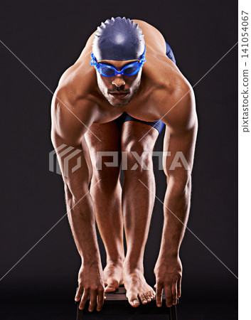 Studio, swimmer and man ready for sport, dive and workout for training and exercise for body. Athlete, adult and male person withs strength, professional and champion for career in black background Studio, swimmer and man ready for sport, dive and workout for training and exercise for body. Athlete, adult and male person withs strength, professional and champion for career in black background 141054067