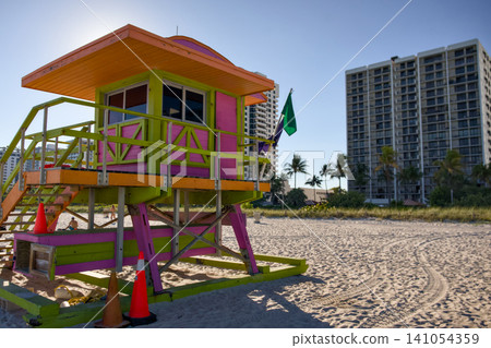 Colorful Lifeguard Tower Standing on Sandy Beach Colorful Lifeguard Tower Standing on Sandy Beach 141054359