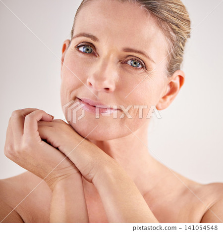 Natural, portrait or mature woman with beauty, confidence or Facial treatment in studio on white background. Face, skincare benefits or proud model with glow, shine or anti aging cosmetics results Natural, portrait or mature woman with beauty, confidence or Facial treatment in studio on white background. Face, skincare benefits or proud model with glow, shine or anti aging cosmetics results 141054548