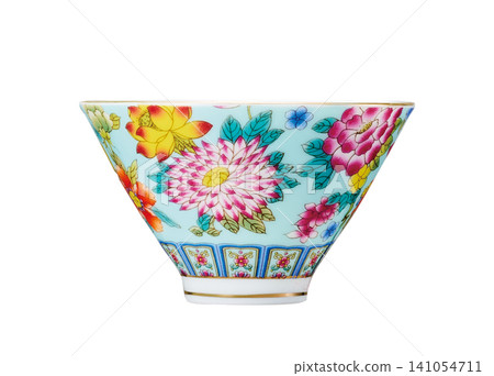 Light blue floral teacup with dahlia pattern, gold trim, conical shape, white background. Light blue floral teacup with dahlia pattern, gold trim, conical shape, white background. 141054711