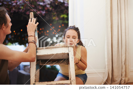 People, chair and furniture sanding in home as couple for maintenance project, construction or living room. Man, woman and bonding in new apartment for antique decor, creative woodwork or carpenter People, chair and furniture sanding in home as couple for maintenance project, construction or living room. Man, woman and bonding in new apartment for antique decor, creative woodwork or carpenter 141054757