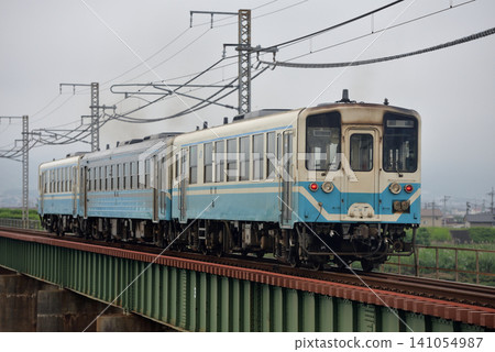 A three-car KiHa 32/54 series train running on the Yosan Line. A three-car KiHa 32/54 series train running on the Yosan Line. 141054987