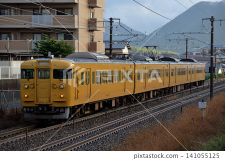 A 4-car 115 series 3000 series local train running on the Sanyo Main Line. A 4-car 115 series 3000 series local train running on the Sanyo Main Line. 141055125