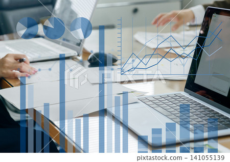 Bar graphs and line graphs: Business meeting scene, data analysis and performance management image Bar graphs and line graphs: Business meeting scene, data analysis and performance management image 141055139