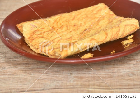 dry salty pounded beef meat Thai snack protein arranging on plate dry salty pounded beef meat Thai snack protein arranging on plate 141055155