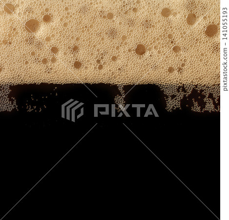 Dark beer foam texture with dense bubbles and black lager layer. Dark beer foam texture with dense bubbles and black lager layer. 141055193