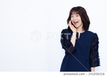 A woman shouting loudly A woman shouting loudly 141056328