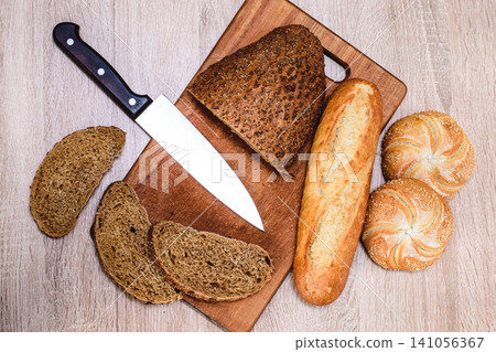 fresh bread on the wooden table fresh bread on the wooden table 141056367