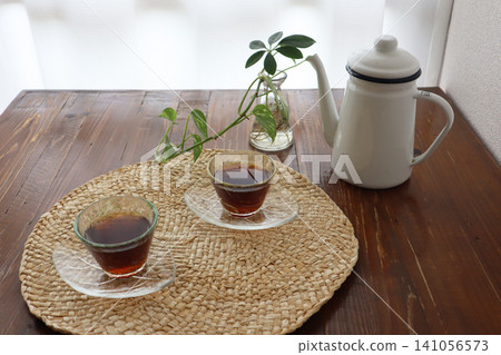 A moment of mindful living and a cool glass vessel A moment of mindful living and a cool glass vessel 141056573