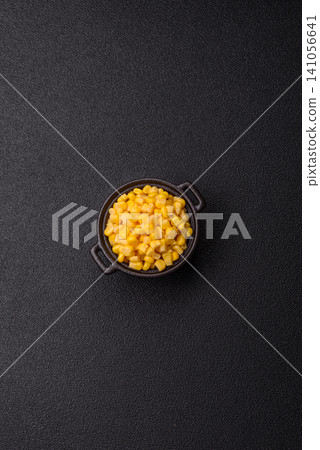 Golden, sweet canned corn kernels or maize for salads and vegetarian dishes. Canned corn Golden, sweet canned corn kernels or maize for salads and vegetarian dishes. Canned corn 141056641