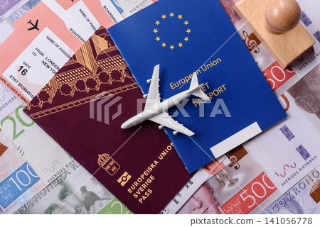 Sweden, swedish passport or id document with tickets for flight, travel. Swedish passport Sweden, swedish passport or id document with tickets for flight, travel. Swedish passport 141056778