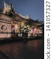 The Longshan Temple, a traditional landmark in Taipei, Taiwan, is beautifully illuminated at night, creating a fantastical scene. 141057327