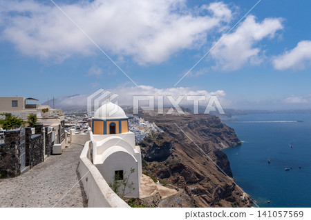 Catholic Church of Saint John the Baptist overlooking Fira caldera cliffs 141057569