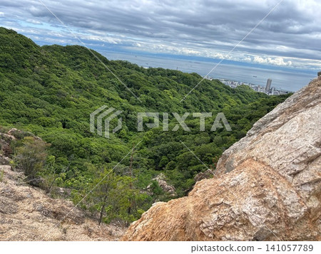 Horseback Rock and Osaka Bay: A view of the sea from the rocky ridge. Horseback Rock and Osaka Bay: A view of the sea from the rocky ridge. 141057789