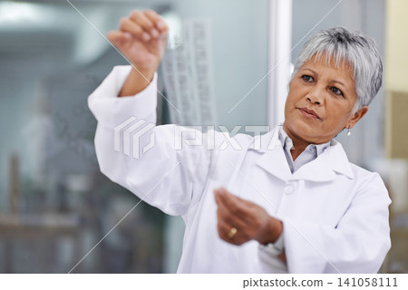 Mature woman, scientist and dna print or pattern with result at lab for data, forensic and analyze for healthcare. Female person, genome research and science study as medical expert to review Mature woman, scientist and dna print or pattern with result at lab for data, forensic and analyze for healthcare. Female person, genome research and science study as medical expert to review 141058111