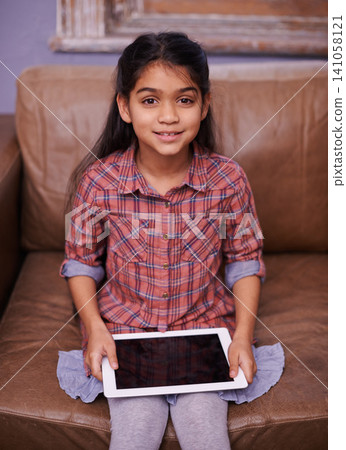 Tablet, search and portrait of girl on a sofa with gaming or sign up at home. Digital, face and kid person in living room online for streaming, video or cartoon, film and chill Tablet, search and portrait of girl on a sofa with gaming or sign up at home. Digital, face and kid person in living room online for streaming, video or cartoon, film and chill 141058121