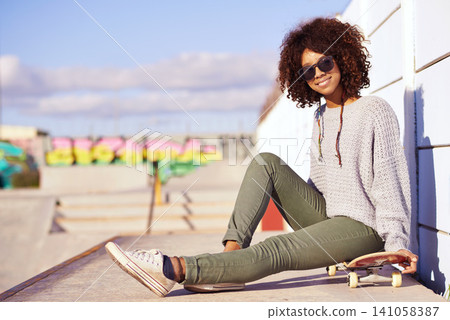 Sunglasses, smile and woman with skateboard in city by wall in summer for sport, leisure and relax outdoor. Happy person, skate park and gen z girl in cool clothes for trendy fashion in South Africa Sunglasses, smile and woman with skateboard in city by wall in summer for sport, leisure and relax outdoor. Happy person, skate park and gen z girl in cool clothes for trendy fashion in South Africa 141058387