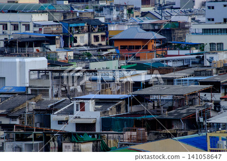 Dense old town rooftops with colorful low-rise residential buildings Dense old town rooftops with colorful low-rise residential buildings 141058647