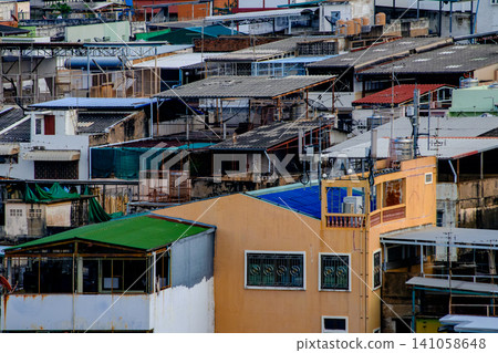 Colorful urban rooftops and densely built low-income residential neighborhood Colorful urban rooftops and densely built low-income residential neighborhood 141058648