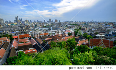Aerial cityscape view with red temple roofs and skyline Aerial cityscape view with red temple roofs and skyline 141058650