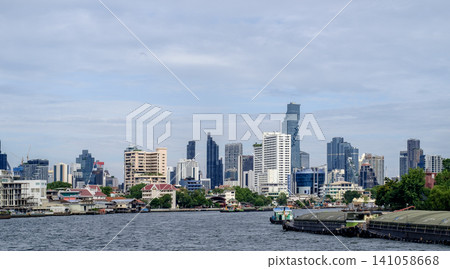 Bangkok Riverside Skyline Modern Skyscrapers and Historic Temples by Chao Phraya River Bangkok Riverside Skyline Modern Skyscrapers and Historic Temples by Chao Phraya River 141058668
