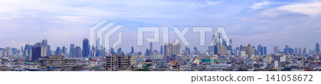 Panoramic skyline of Bangkok city with modern skyscrapers under blue sky Panoramic skyline of Bangkok city with modern skyscrapers under blue sky 141058672
