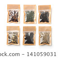 Front view of paper bags with various tea 141059031
