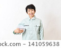 Senior Asian female worker wearing a helmet 141059638