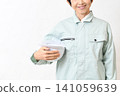 Senior Asian female worker wearing a helmet 141059639