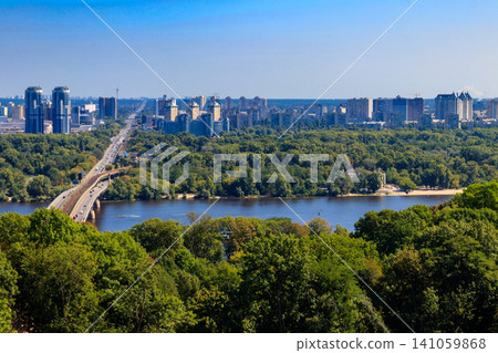 Aerial view of Metro bridge and the Dnieper river in Kiev, Ukraine. Kyiv cityscape Aerial view of Metro bridge and the Dnieper river in Kiev, Ukraine. Kyiv cityscape 141059868