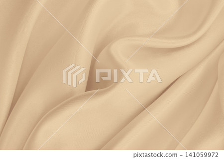 Smooth elegant golden silk or satin luxury cloth texture as wedding background. Luxurious background design. In Sepia toned. Retro style Smooth elegant golden silk or satin luxury cloth texture as wedding background. Luxurious background design. In Sepia toned. Retro style 141059972