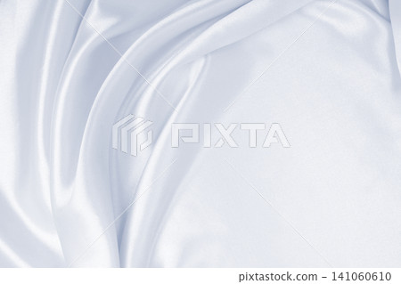 Smooth elegant grey silk or satin luxury cloth as wedding background. Luxurious background design Smooth elegant grey silk or satin luxury cloth as wedding background. Luxurious background design 141060610