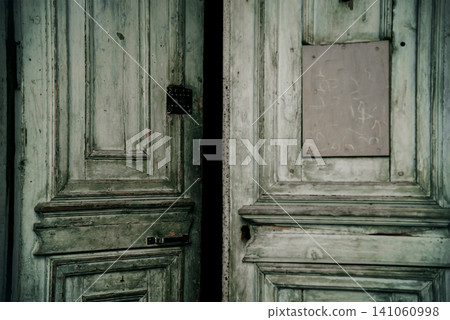 Entrance door small residential house in neighborhood, exterior building outside 141060998