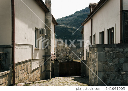 Small residential house cottage in suburbs neighborhood country exterior outside Small residential house cottage in suburbs neighborhood country exterior outside 141061005