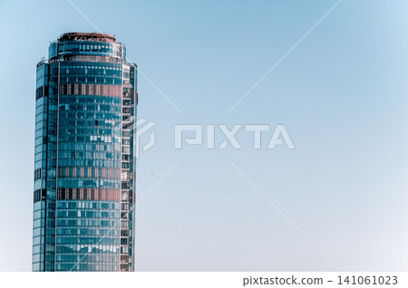 Glass tall multi-storey buildings skyscrapers in center downtown architecture Glass tall multi-storey buildings skyscrapers in center downtown architecture 141061023