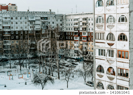 Old ugly shabby Soviet panel residential multi-storey building exterior outside Old ugly shabby Soviet panel residential multi-storey building exterior outside 141061041