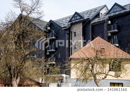 Modern multi-storey city residential apartment house, exterior building outdoor Modern multi-storey city residential apartment house, exterior building outdoor 141061168