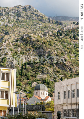 Kotor, Montenegro, Residential building and temple in mountains 141061183