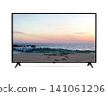 Smart tv with ocean bay beach at sunset on screen 141061206