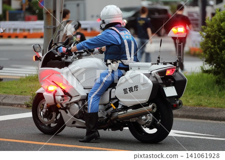 Image of a police motorcycle on patrol 141061928