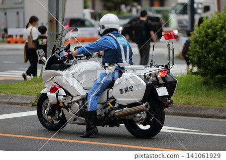 Image of a police motorcycle on patrol 141061929
