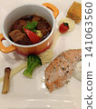 Salmon sauté and chunky meat stew 141063560